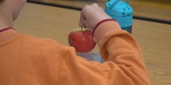 Hampden 2nd graders celebrate inaugural Maine Apple Crunch Day with synchronized bite