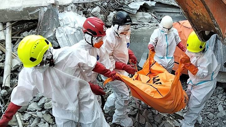Death toll in Indonesian school collapse rises to 61 as more bodies are recovered