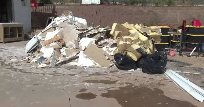 Volunteers, restoration crews clean up southern Utah town after flooding