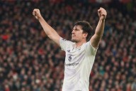Manchester United beats Liverpool 2-1 with Maguire's late goal in big boost for Amorim
