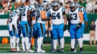 Faced with another new grouping, offensive line comes through again