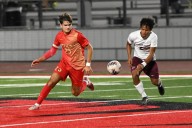 Troy Athens pulls away from Warren Mott, advances to district finals