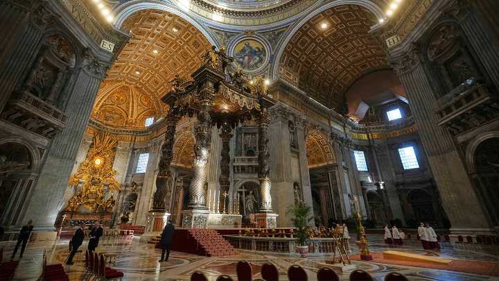 Man disrupts St. Peter's Basilica, climbs altar before security escort