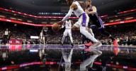 Gabe Vincent in walking boot after leaving Kings games with ankle sprain