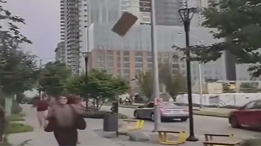Plywood falls from Seattle construction site toward walkers