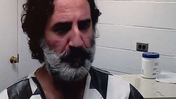 Man accused of shooting at landscapers, officers during standoff makes first court appearance
