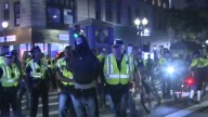 4 officers injured, 13 people arrested during Boston pro