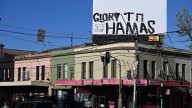 Pro-Hamas graffiti scrawled on billboard at major intersection in Melbourne’s inner north