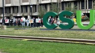 Students, alumni gather at Cleveland State University for silent rally following changes to WCSB