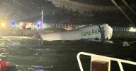 Hong Kong plane crash: Two dead as cargo aircraft skids off runway into sea