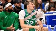 Mavs' Cooper Flagg hurts shoulder, is benched in crunch time