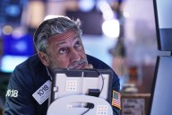 Wall Street rallies to recover some of Friday's sell-off after Trump softens his criticism of China