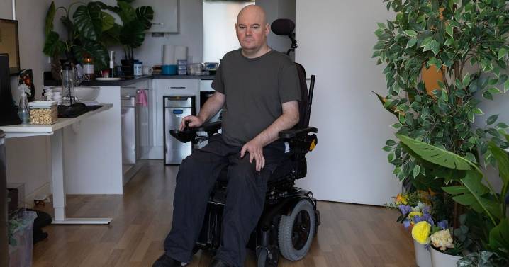 'I'm quadriplegic and have to ask strangers to let me in my flat - I've waited months for door device'