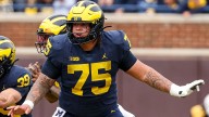 Son's decision to play for Michigan leaves ex-Spartan Strayhorn in a pickle