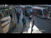 Security guard saves woman from oncoming train