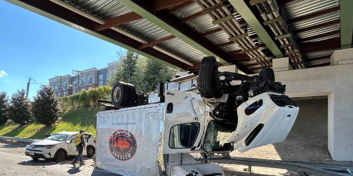 Box truck overturns after crash on I