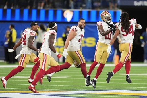 Short-handed 49ers stop Rams on downs in overtime, preserving a 26