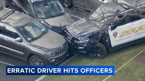 Officer repeated hit by same vehicle in Plymouth Twp. hotel parking lot; 2nd officer also hurt