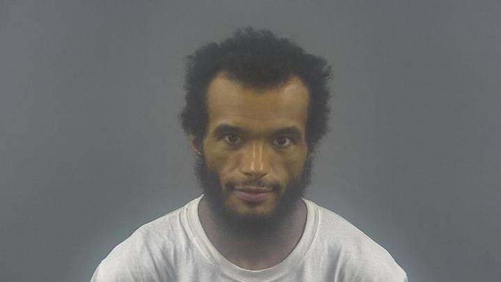 Man arrested following shots fired report on Adams Street
