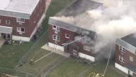 Twin home fire sends white smoke into air over Northeast Philly