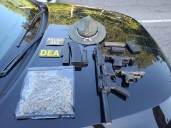 Task force seizes guns, drugs after traffic stop