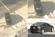 Driver crashes into steps of LA City Hall, barricades himself inside car: reports