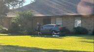 Car crashes into the side of a house near Highland Road