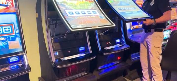 Police seize hundreds of illegal slot machines from 2 arcades