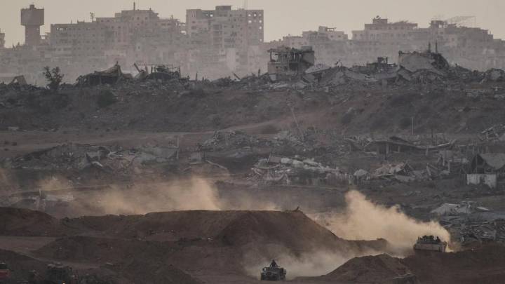 Israel delays aid after slow Hamas return of bodies