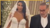 Outrage In Iran Over Hijab Enforcer’s Daughter Wearing Revealing Wedding Dress