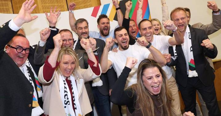 Munich's mayor celebrates victory in a vote on bidding for the Olympics