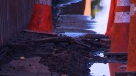 Denver property owners dispute cause of water damage
