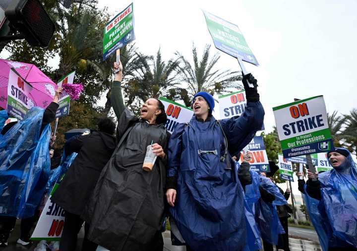 Thousands of nurses strike at Kaiser as rain pounds Southern California