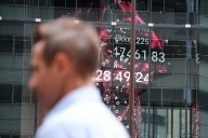 Asian shares retreat after worries over bank lending pull Wall St lower