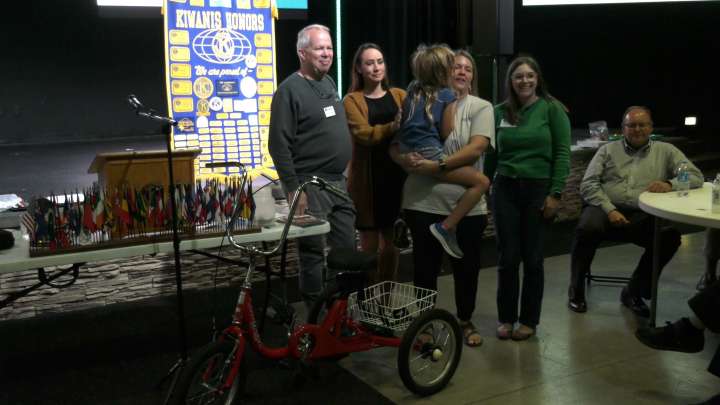 Kiwanis Club of Bowling Green presents AmTryke to local child