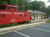 Restoration nearly complete on little red caboose in Norge