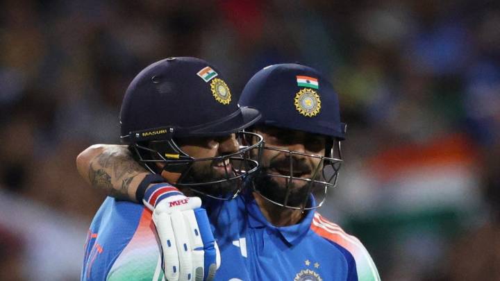 Rohit Sharma embraces Virat Kohli after hitting hundred in Australian swansong
