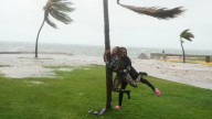 Hurricane Melissa's eye rolls ashore as Jamaicans shelter and wait