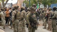 Tear gas released on crowd, Border Patrol describes pursuit and arrests