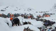 Trekker uses cooking pots to dig her way out of freak blizzard on Everest