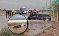 WATCH: 2 rescued after driver ignores road closure, gets stuck in Murphy flood