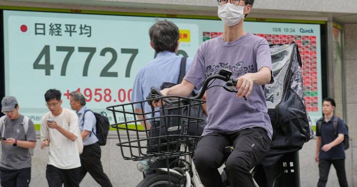 Asian shares advance and oil prices fall as Israel and Hamas agree to pause fighting