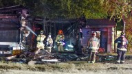 Investigation underway after home catches fire in Manor