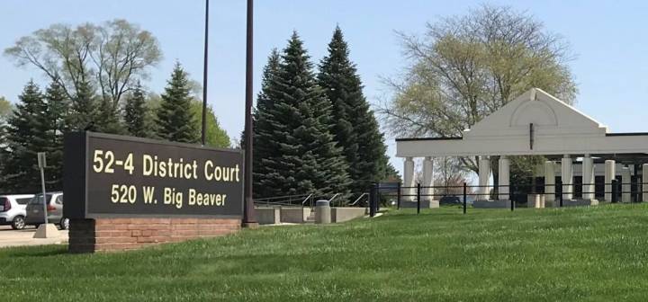 Detroiter accused of embezzling $80K while working as bank teller in Troy