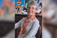 Suzanne Rees found dead on Great Barrier Reef island after left by cruise