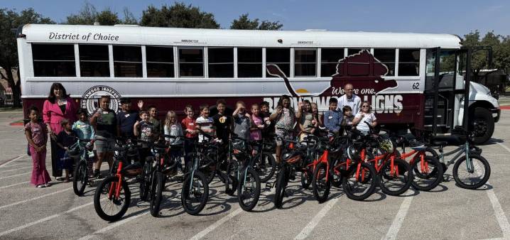 BISD elementary students help build bikes as part of Hendrick Leadership Development Institute Summit