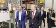 Gov. Jared Polis visits Care and Share Food Bank