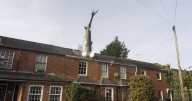 UK's most famous house with 25ft shark sticking out of roof is back on market to rent