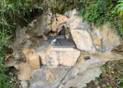 Los manantiales sellados con cemento cerca de Bogotá escalan las críticas ambientales contra Coca