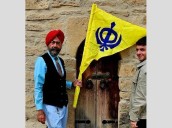 First in 557 years, Nishan Sahib hoisted at historic site of Guru Nanak Dev in Baku, Azerbaijan [ FULL VIEW ]